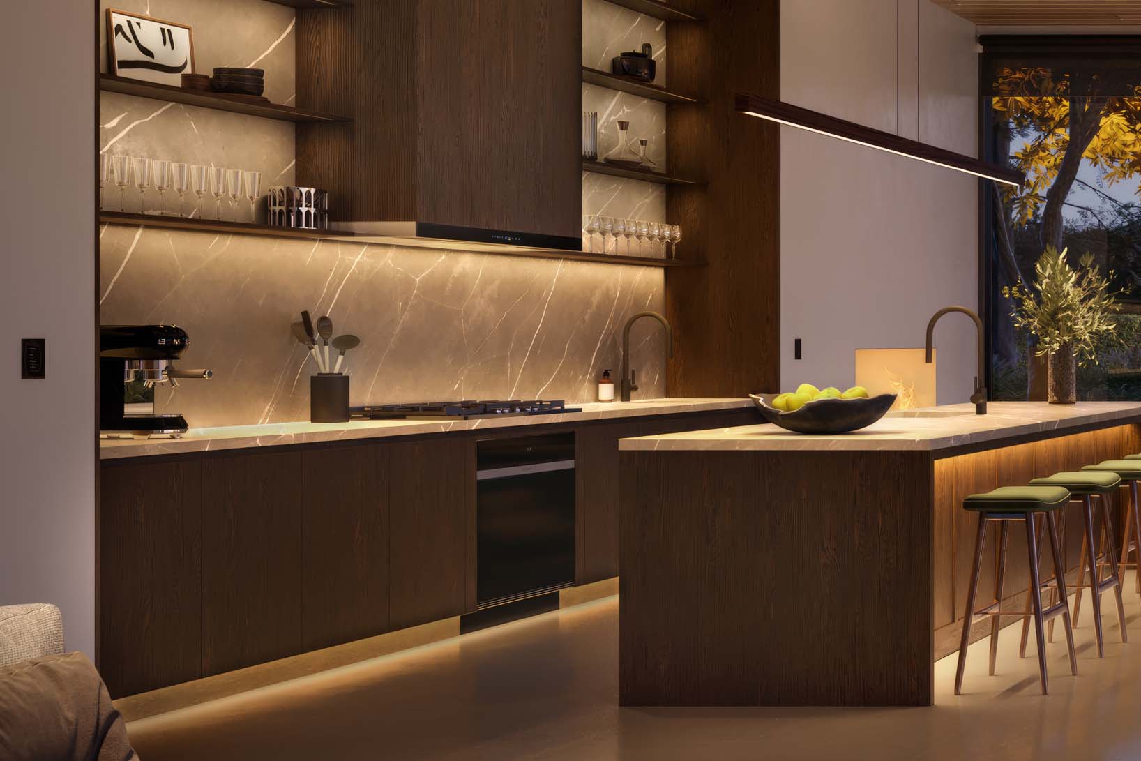 Modern kitchen with dark wood cabinets, marble backsplash, under-cabinet lighting, and a central island with green bar stools and a bowl of apples.